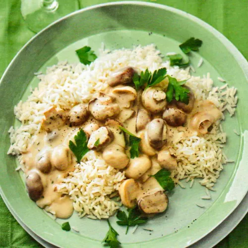 Champignons in Weißweinsauce mit Reis